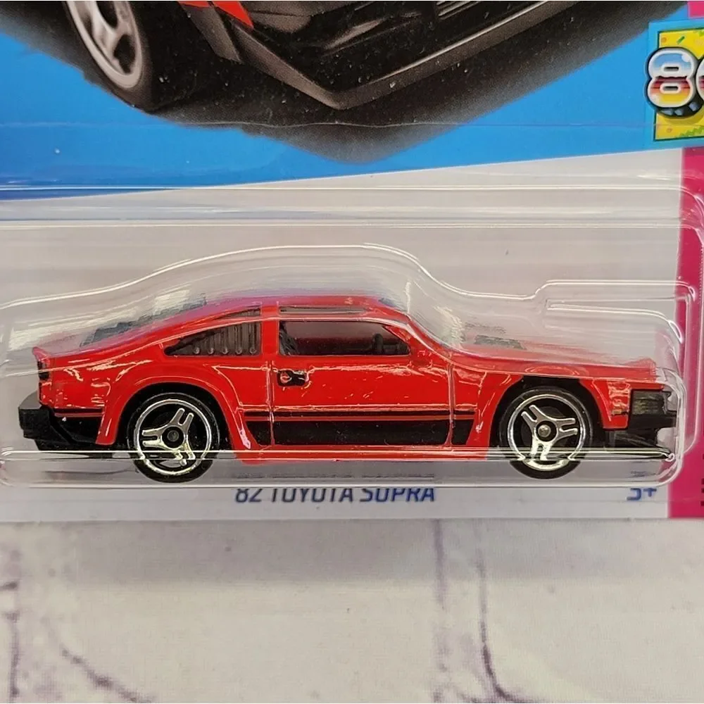 NIB Hot Wheels	'82 Toyota Supra -	HW: The '80s - HKG87	- Red - 167/250 - 10/10